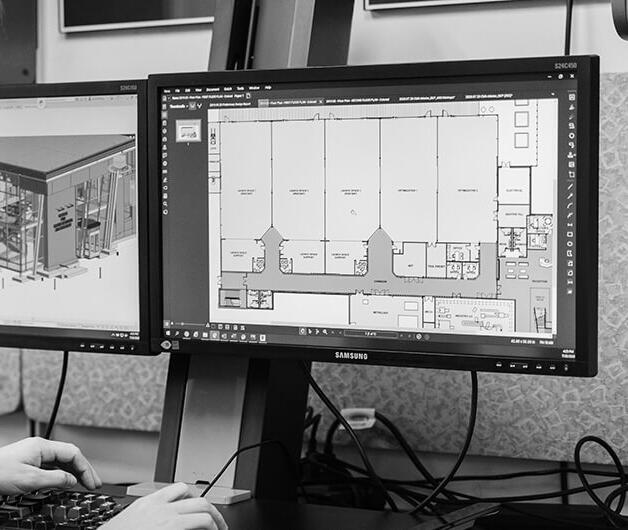 Architectural services Principal performs architectural services by drawings plans on a computer.